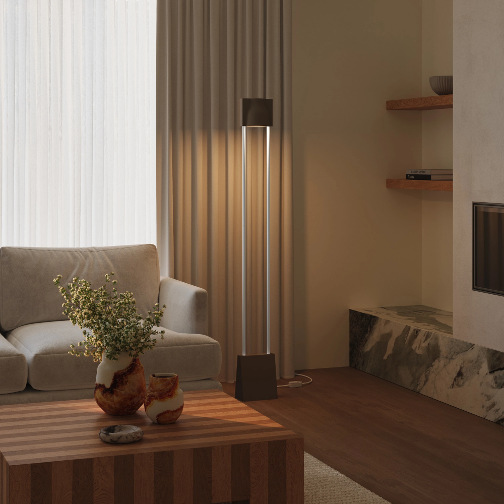 The walnut Carve Floor Light from Gantri with the white rod option in a living space.
