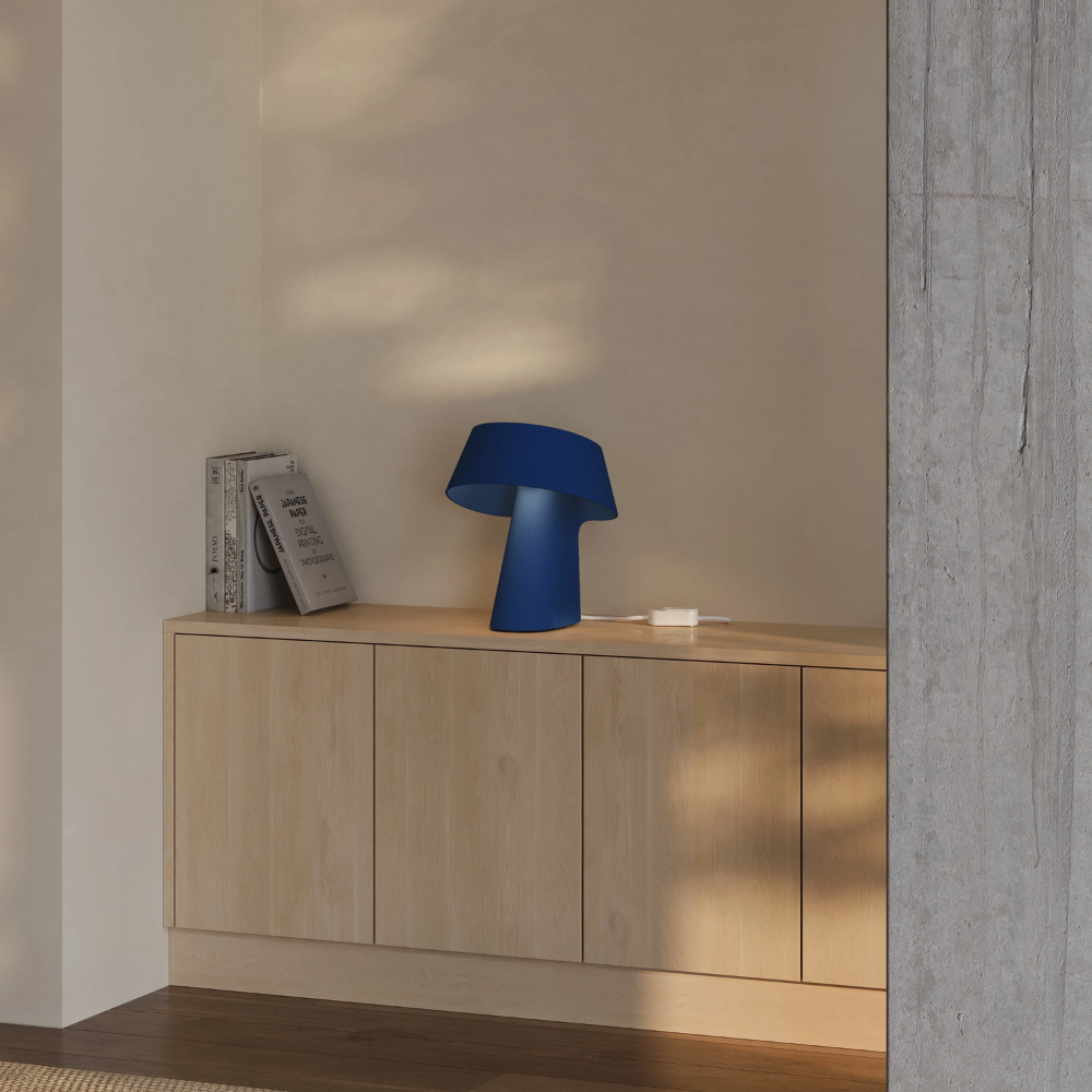 The midnight Fold Table Light from Gantri in a living room.
