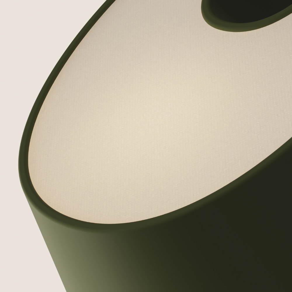 The olive Fold Table Light from Gantri close up.