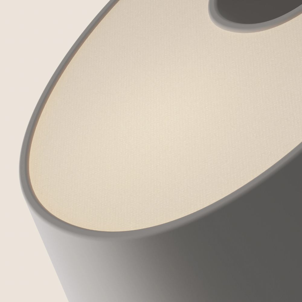 The stone Fold Table Light from Gantri close up.