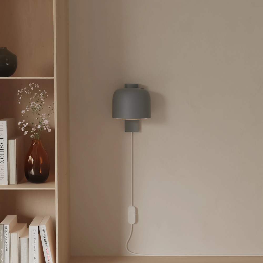The fog Gio Wall Light from Gantri in a living room.