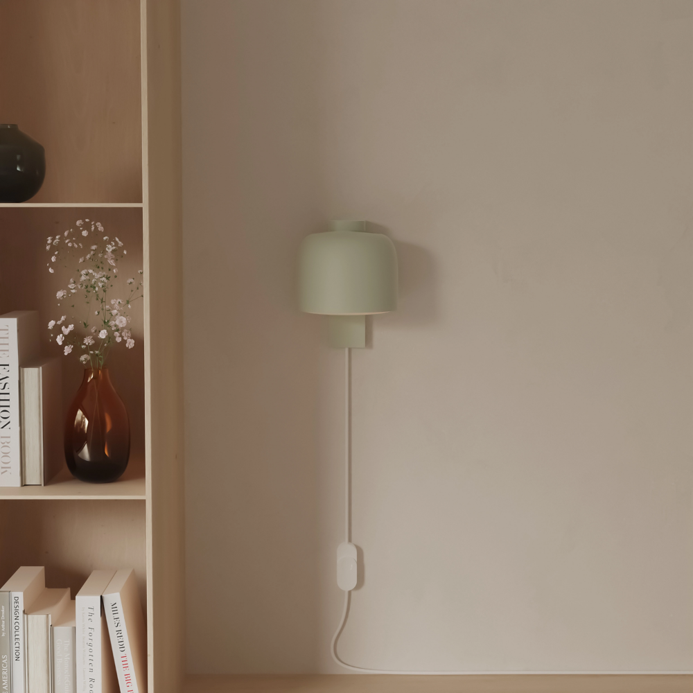 The meadow Gio Wall Light from Gantri in a living room.