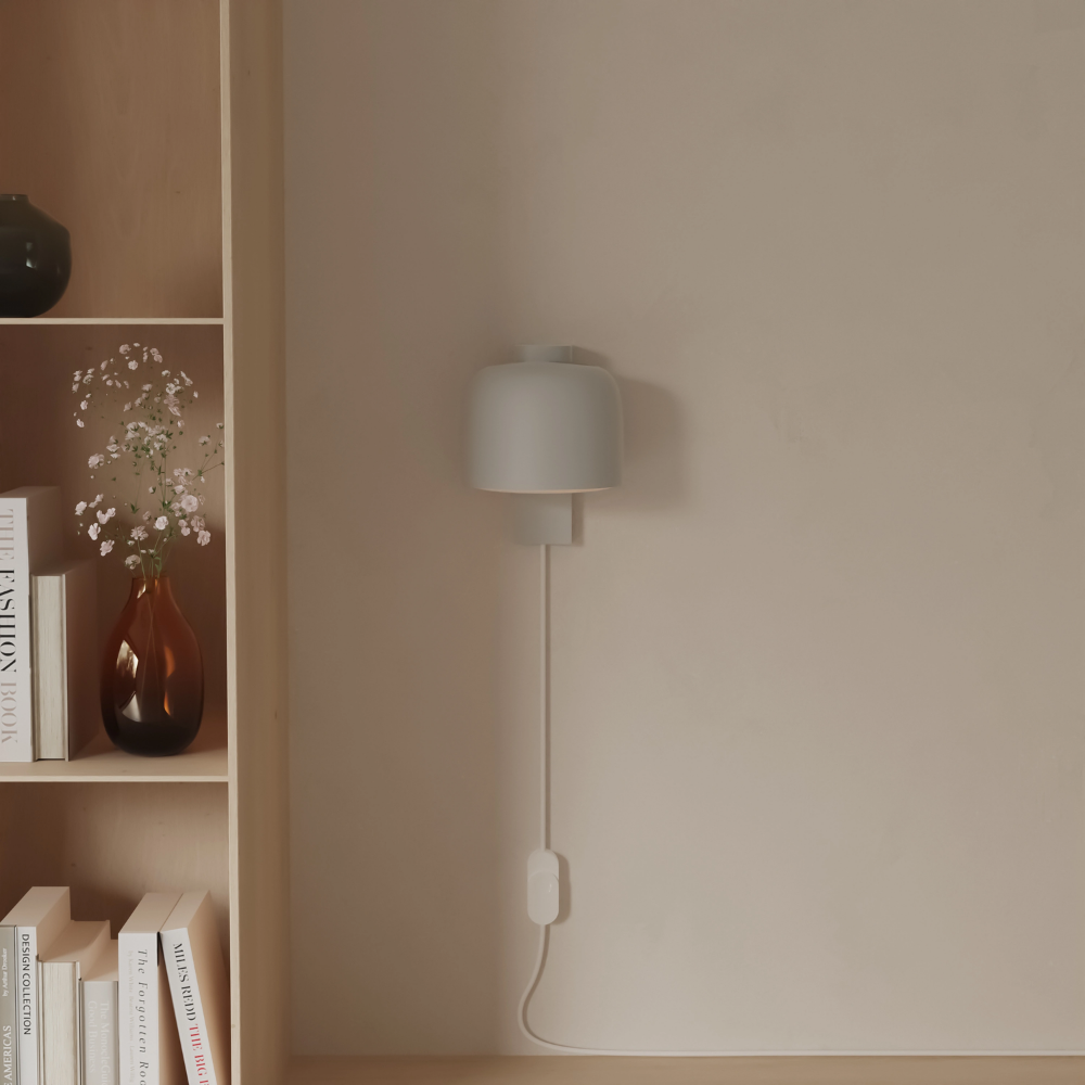 The mist Gio Wall Light from Gantri in a living room.