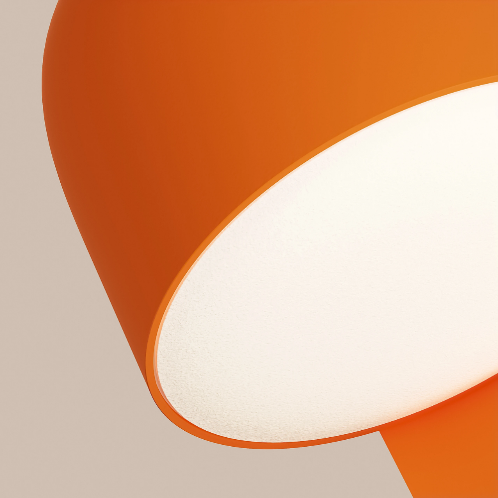 The persimmon Gio Wall Light from Gantri close up.