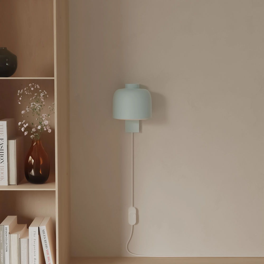 The sky Gio Wall Light from Gantri in a living room.