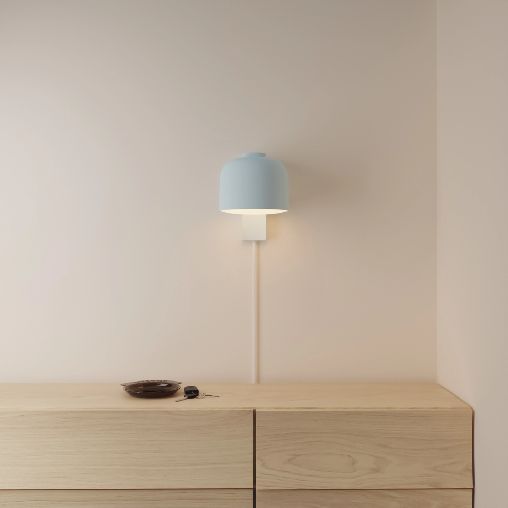 The sky Gio Wall Light from Gantri in a primary bedroom.