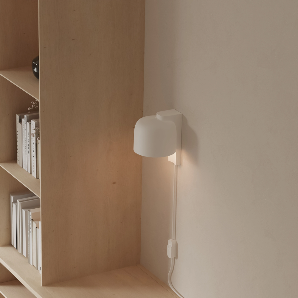 The snow Gio Wall Light from Gantri in a home office.