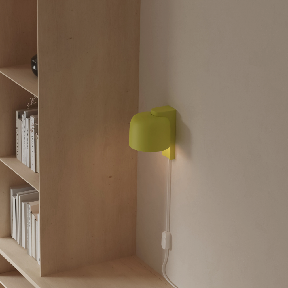 The sprout Gio Wall Light from Gantri in a home office.