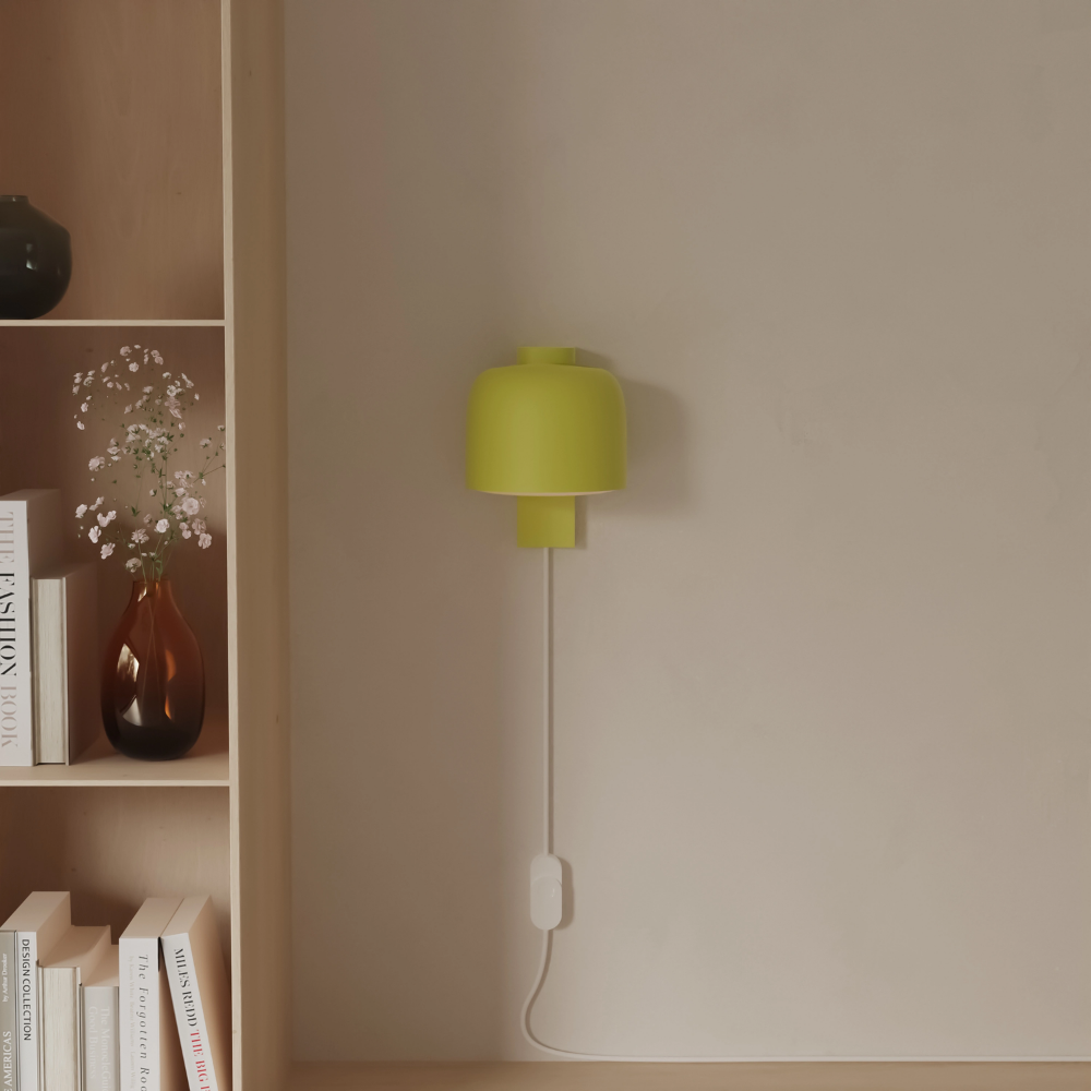 The sprout Gio Wall Light from Gantri in a living room.