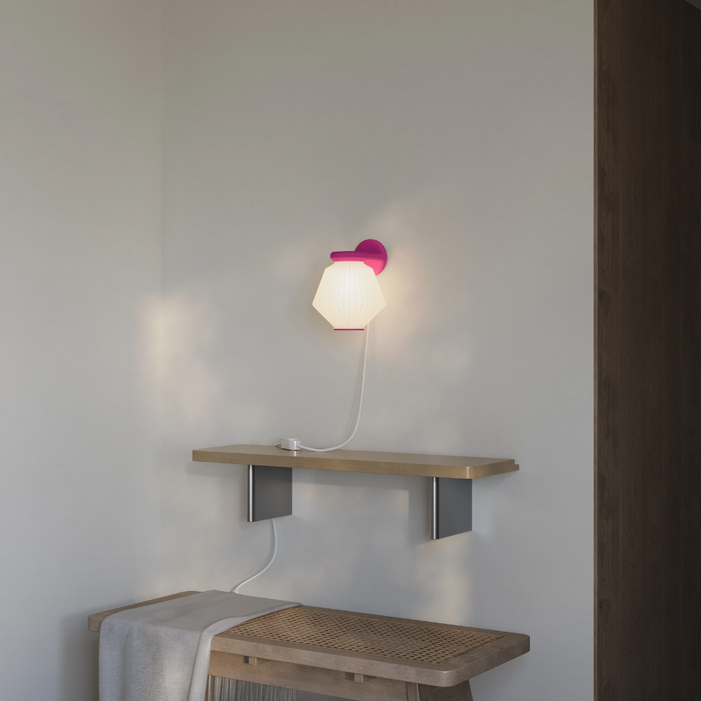 The hibiscus Granada Wall Light from Gantri in a living room.