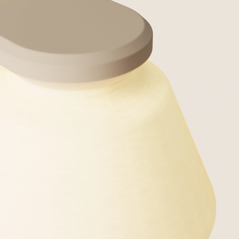 The peach Granada Wall Light from Gantri close up.