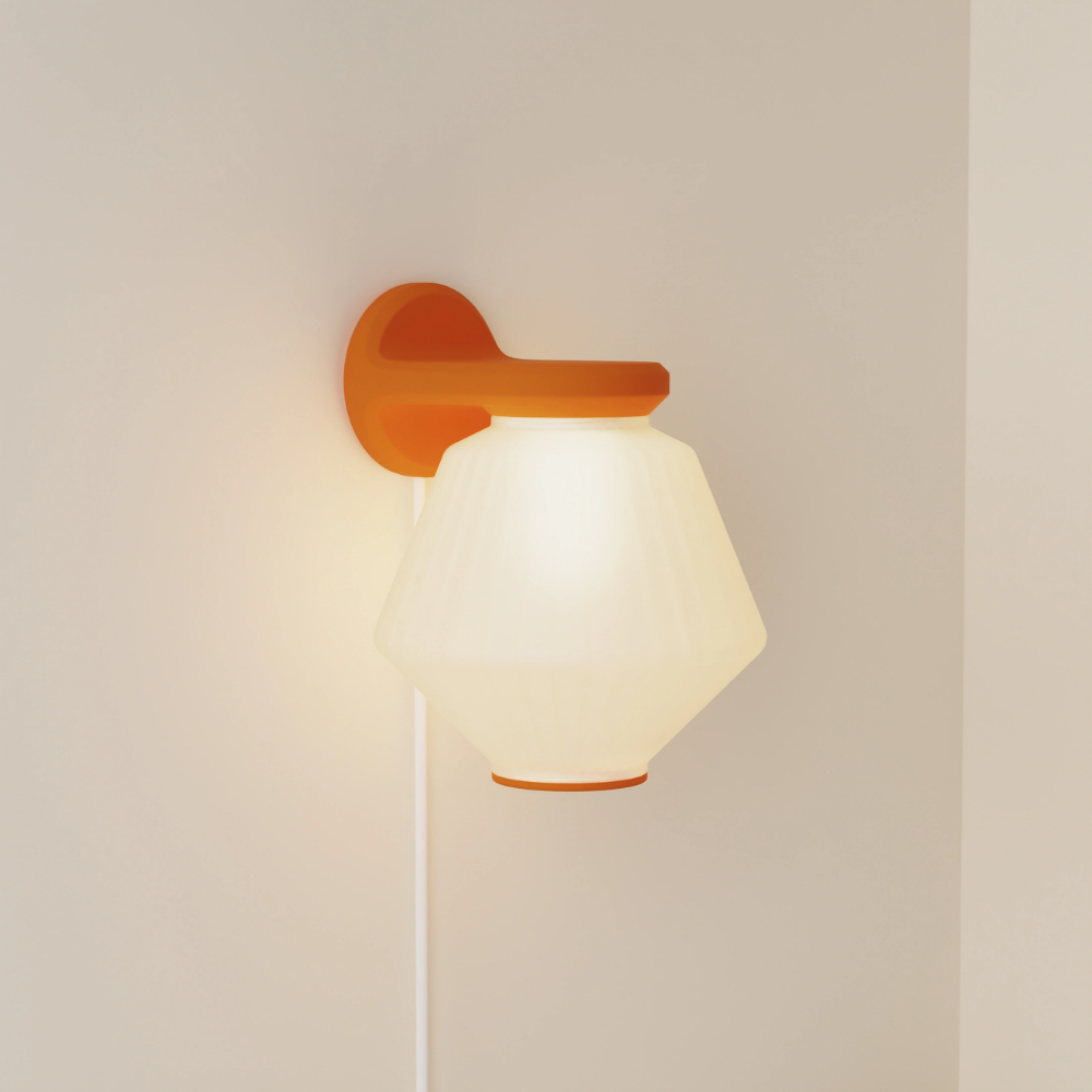 The persimmon Granada Wall Light from Gantri.