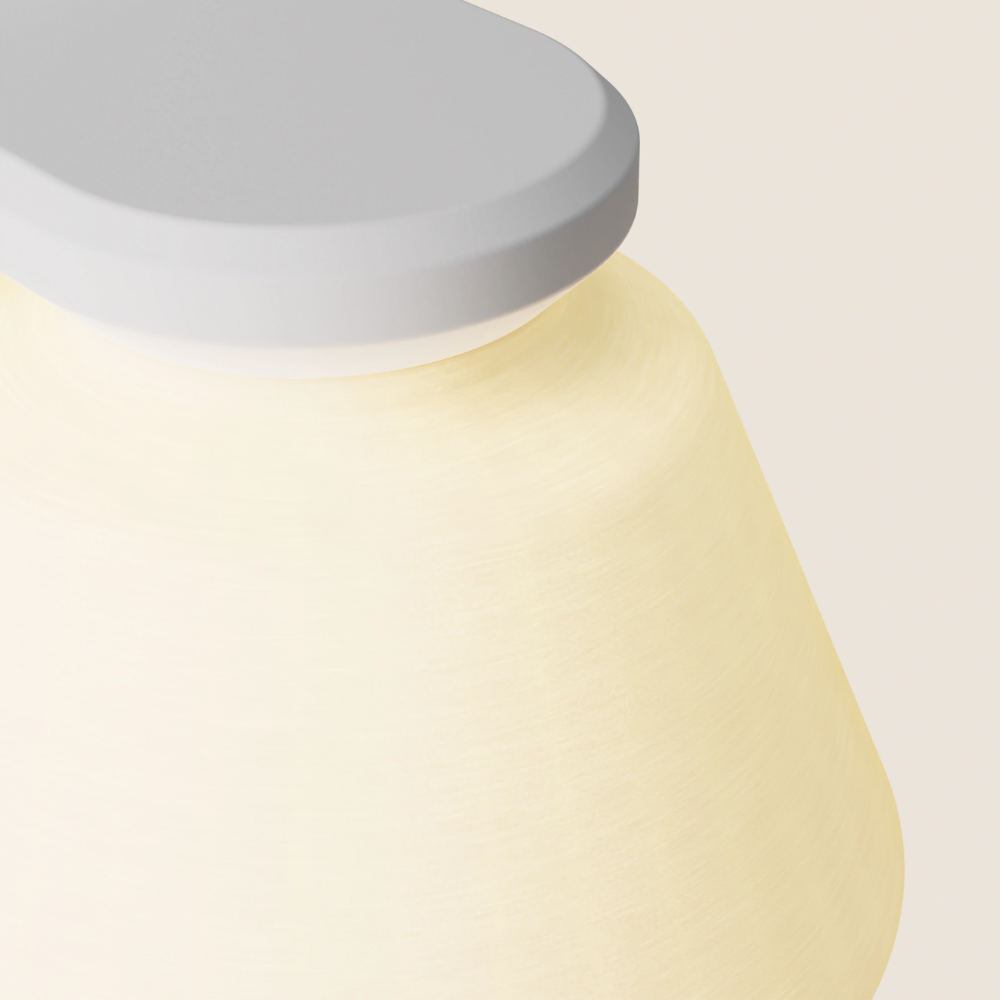 The snow Granada Wall Light from Gantri close up.