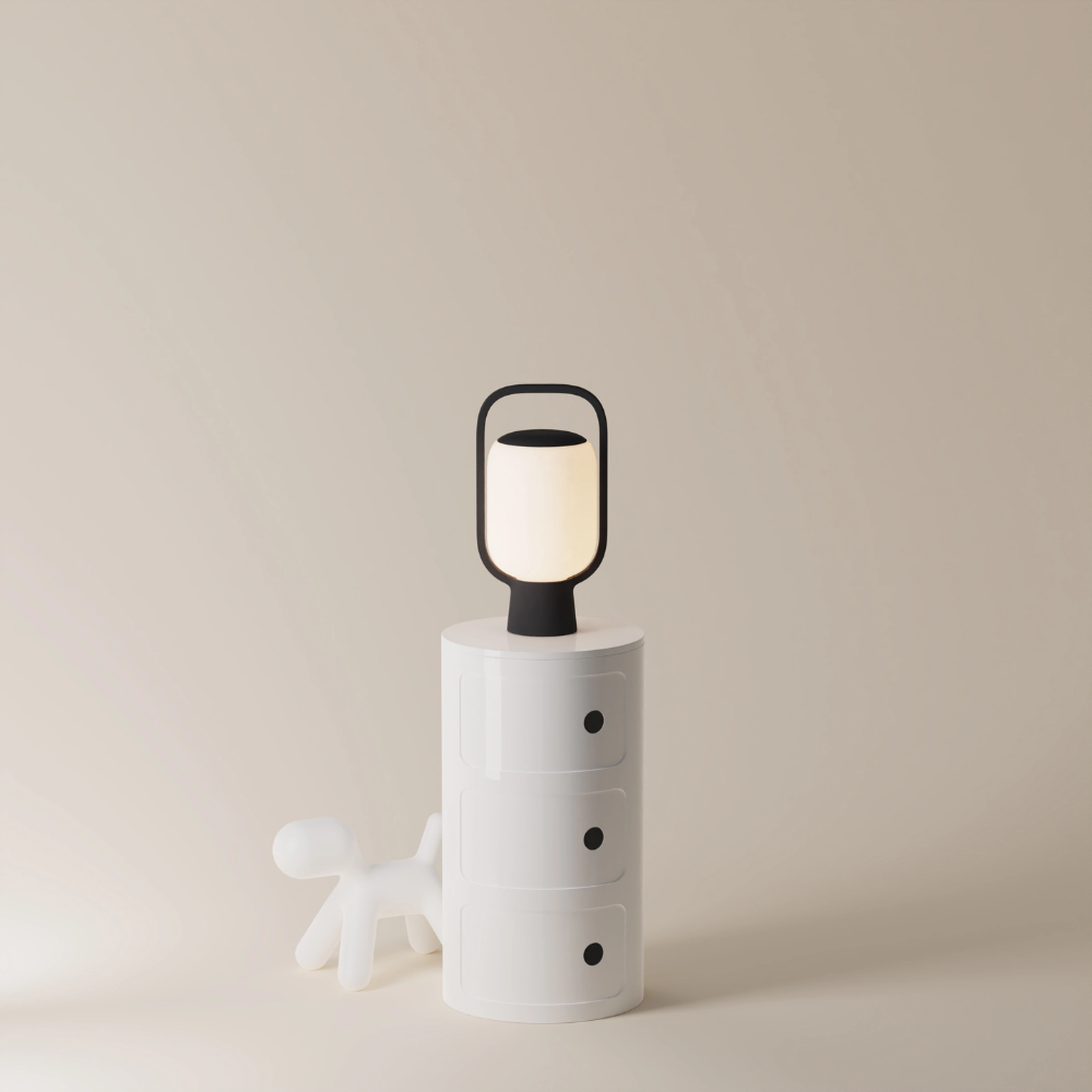 The carbon Kero Table Light from Gantri in a home office.