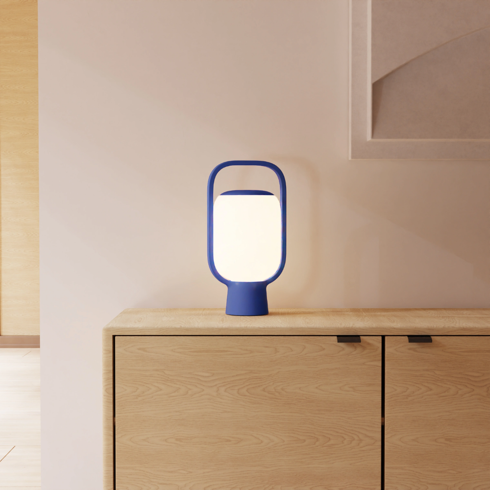 The cobalt Kero Table Light from Gantri in a family area.