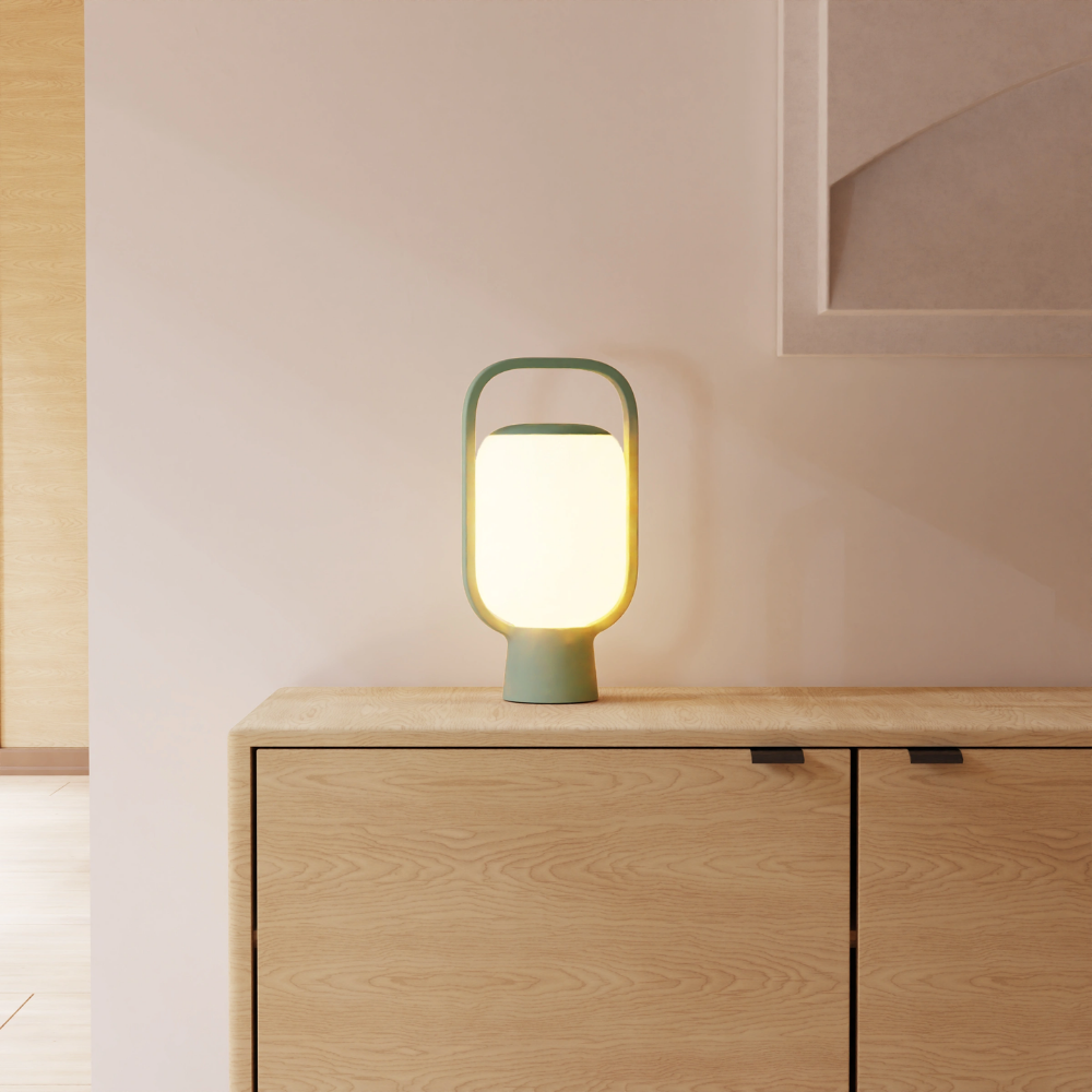 The sage Kero Table Light from Gantri in a family area.