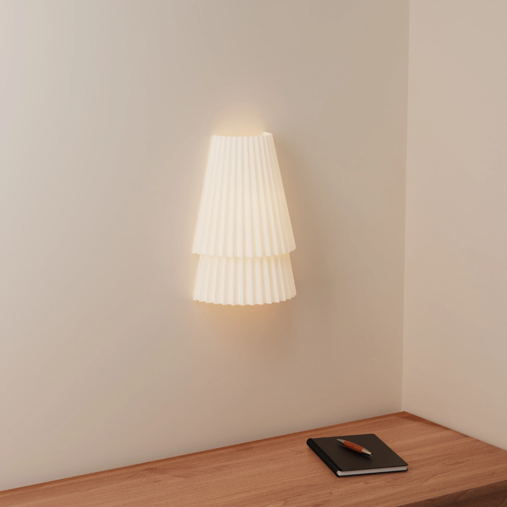 The Pleat Wall Sconce from Gantri in a home office.