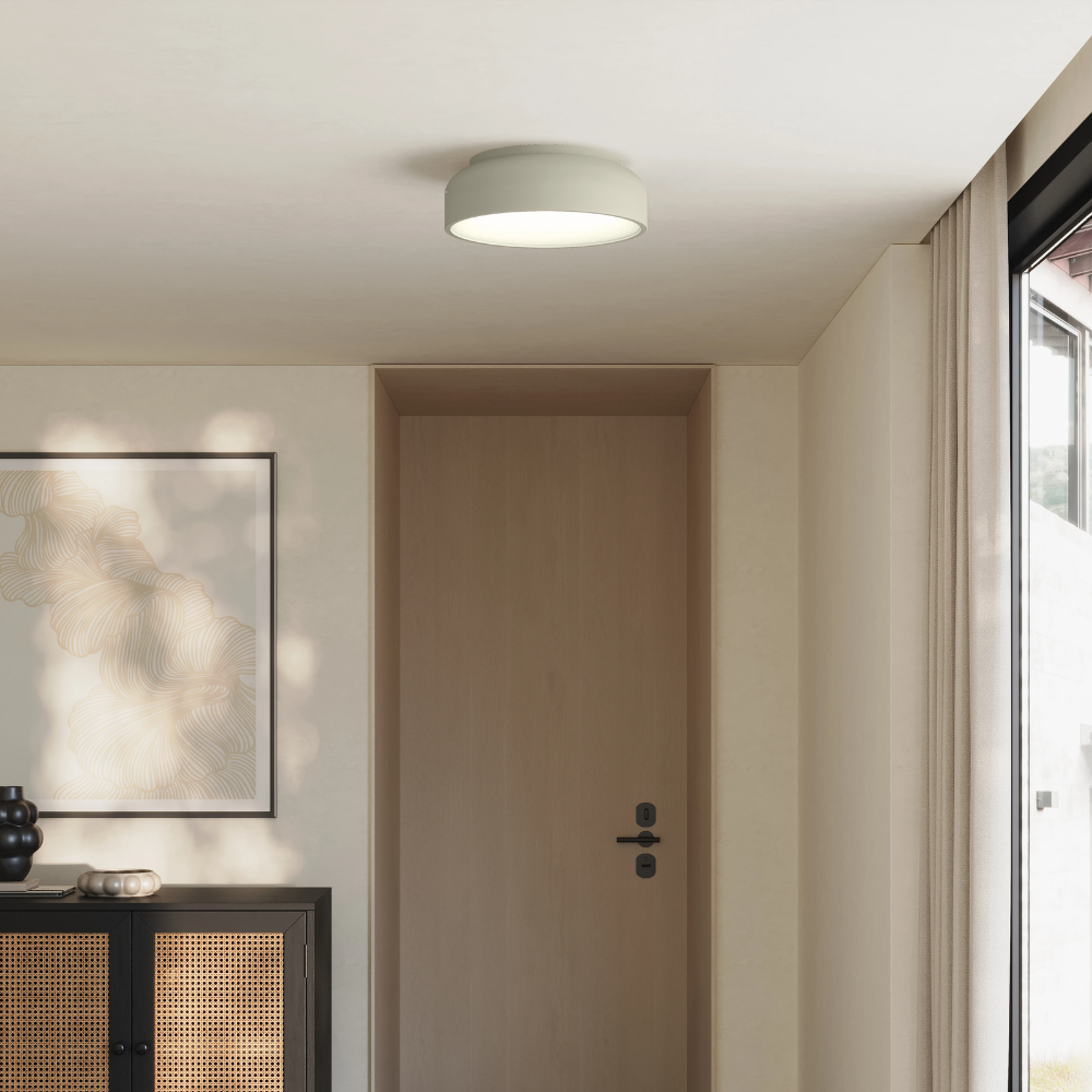 The meadow Vitria Flush Mount from Gantri in a living room on the ceiling.