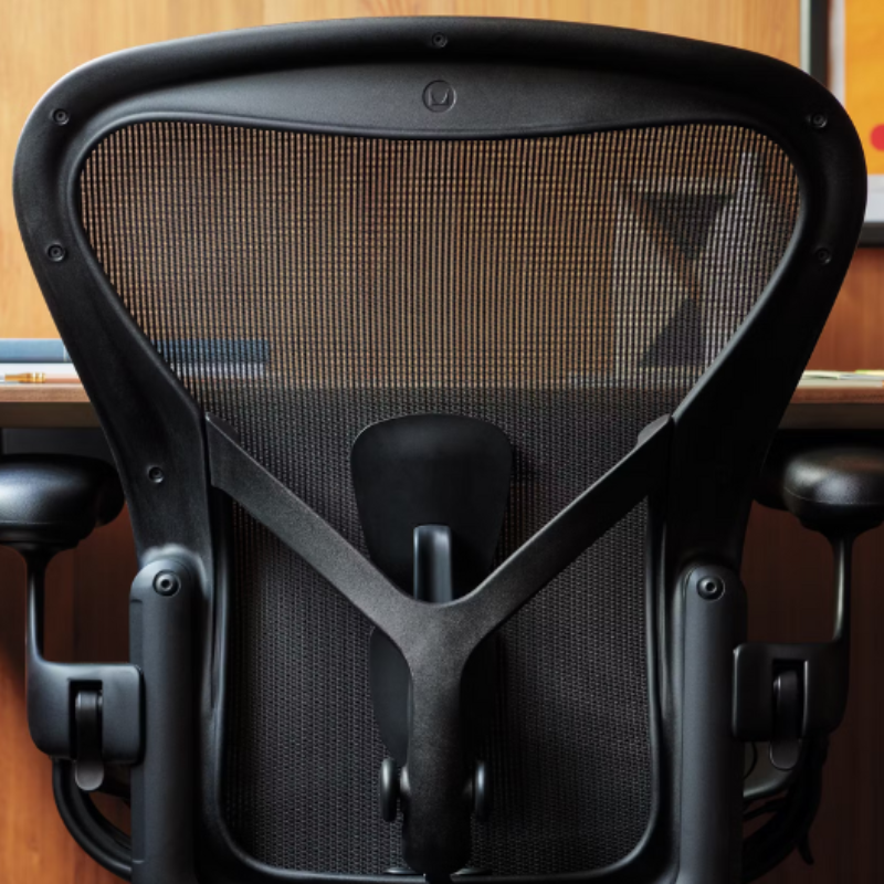 The Aeron Chair from Herman Miller in a close up lifestyle photograph.