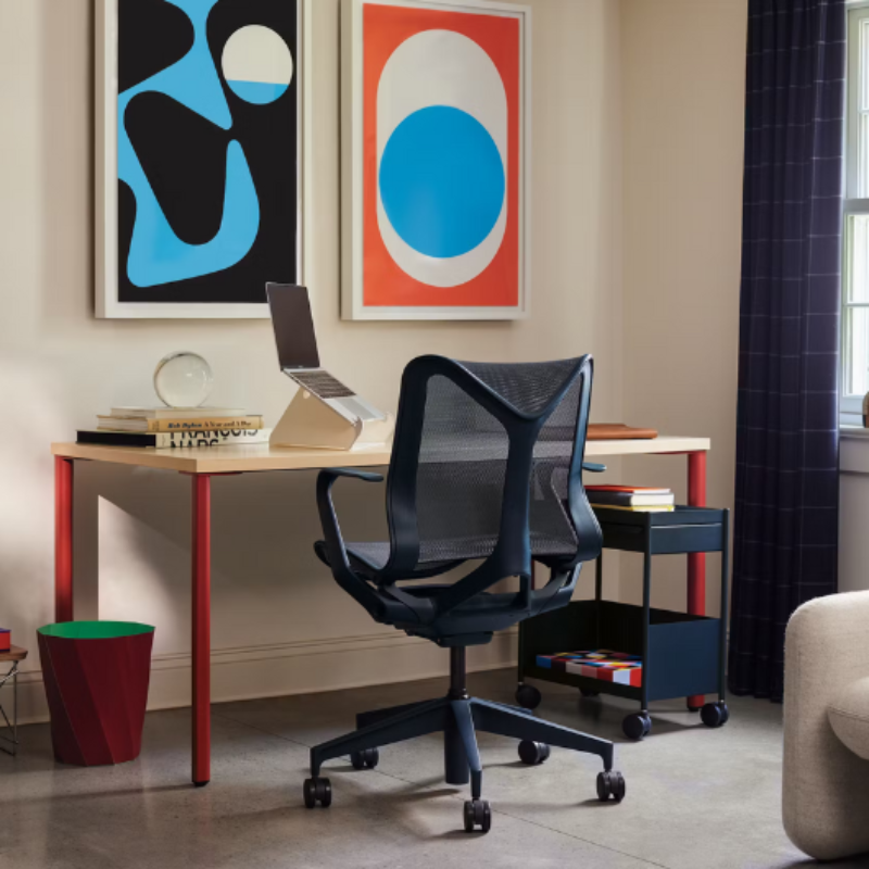 The nightfall Cosm Office Chair from Herman Miller is used for desk seating in a living space.