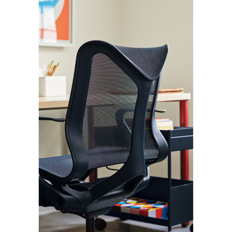 The nightfall Cosm Office Chair from Herman Miller in an office, close up.