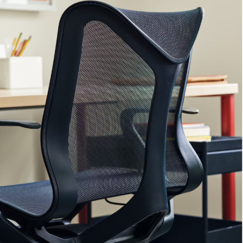 The nightfall Cosm Office Chair from Herman Miller in an office, close up.