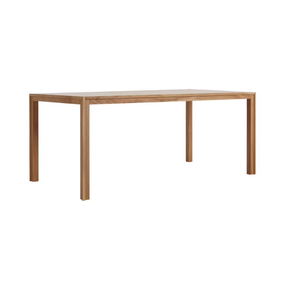 The oak 70 x 36 inch Doubleframe Table from Herman Miller from an angle.