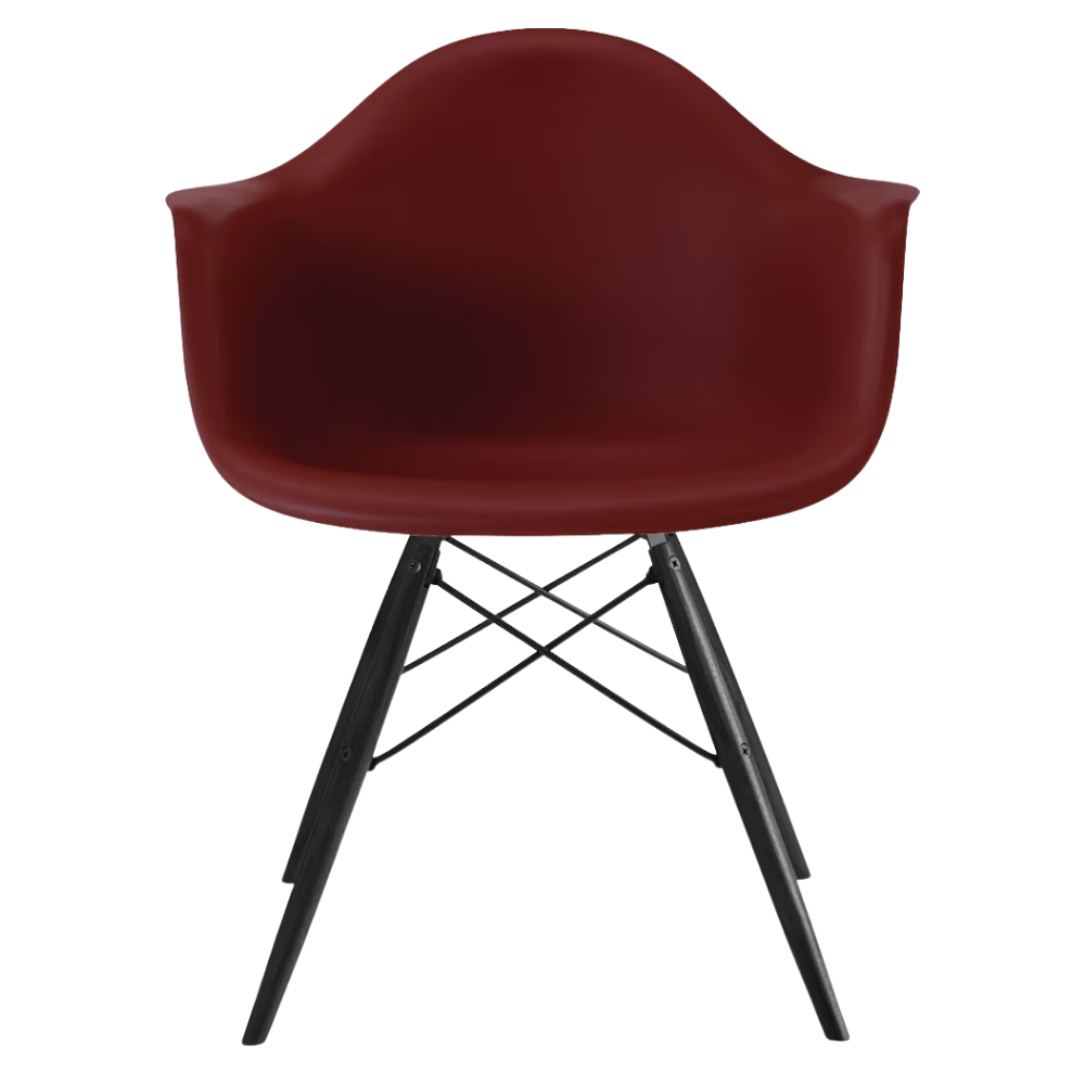 The brick red shell Eames Molded Plastic Armchair Dowel-Leg Base with the black base and ebony legs.