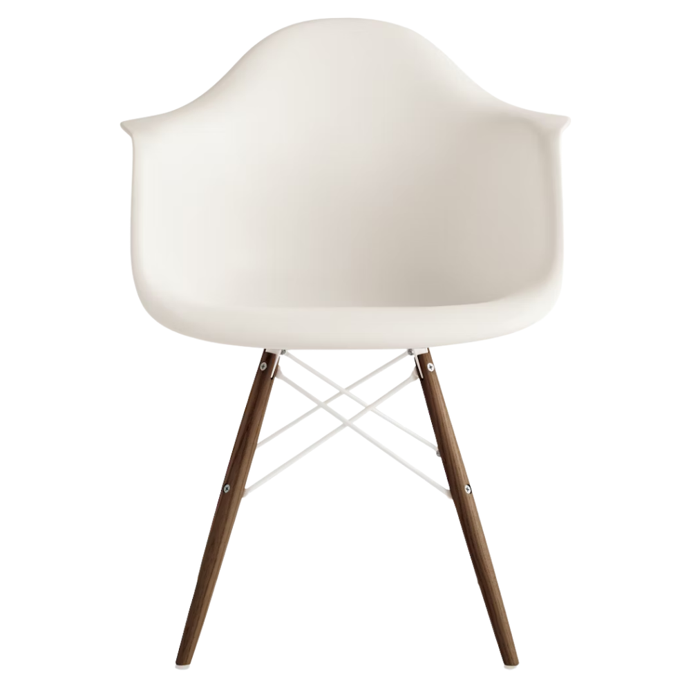 The white shell Eames Molded Plastic Armchair Dowel-Leg Base with the white base and walnut legs.