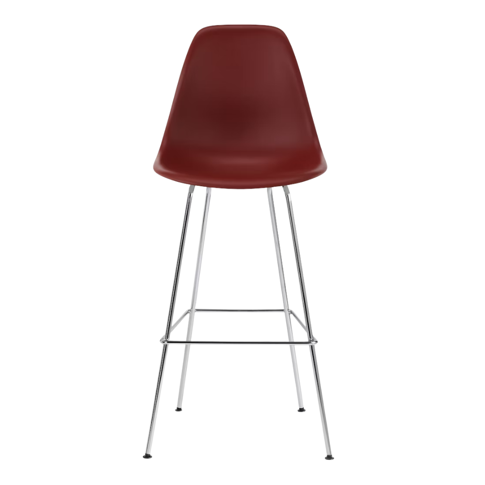 The brick red shell Eames Molded Plastic Bar Height Stool from Herman Miller with the trivalent chrome base.