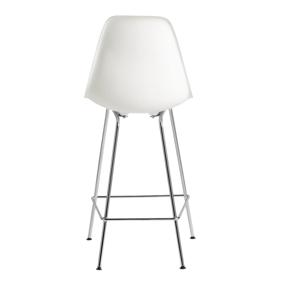 The white shell Eames Molded Plastic Counter Height Stool from Herman Miller with the trivalent chrome base from the back.