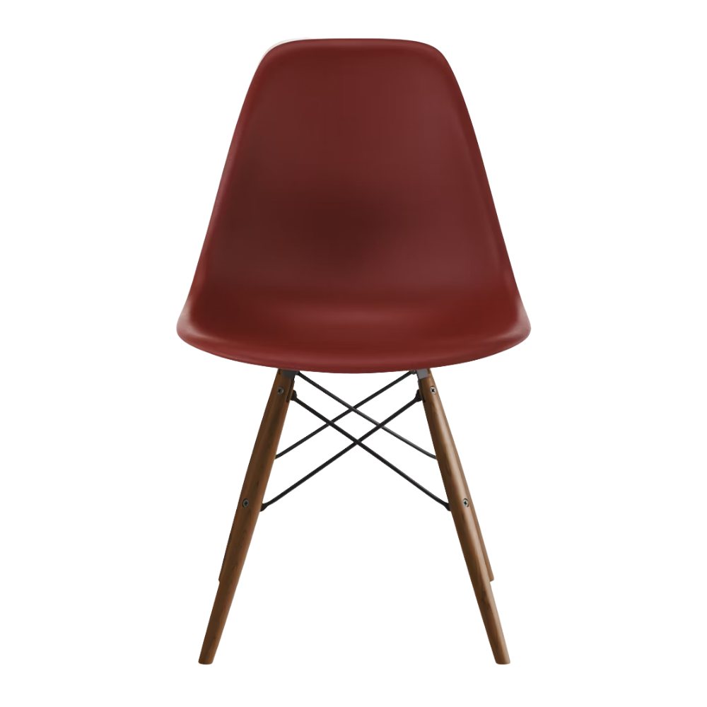The brick red shell Eames Molded Plastic Side Chair Dowel-Leg Base from Herman Miller with the black base and walnut legs.