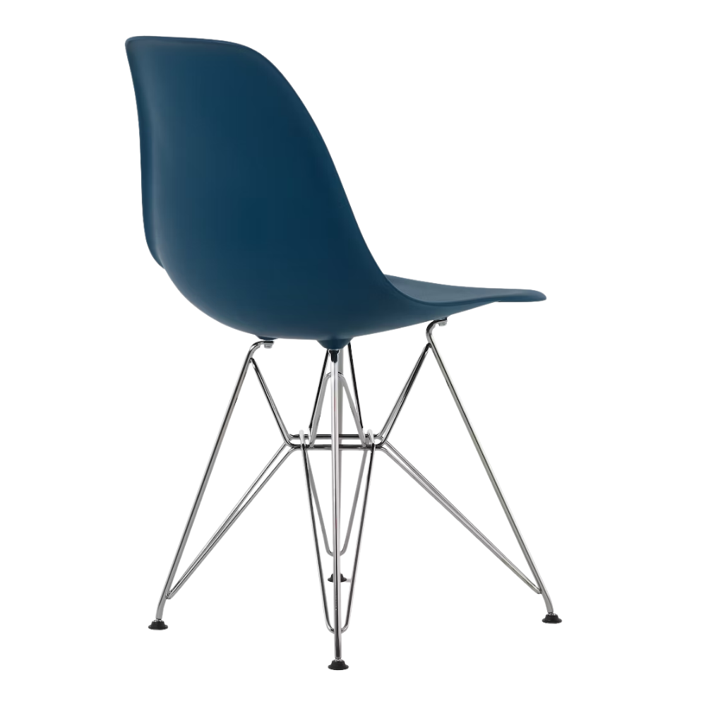 The blue green shell Eames Molded Plastic Side Chair Wire Base from Herman Miller with trivalent chrome base from the back at an angle.