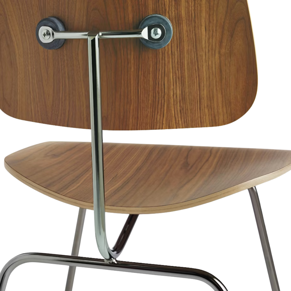 The Eames Molded Plywood Dining Chair Metal Base from Herman Miller with the santos palisander shell and trivalent chrome legs highlighting the backrest.