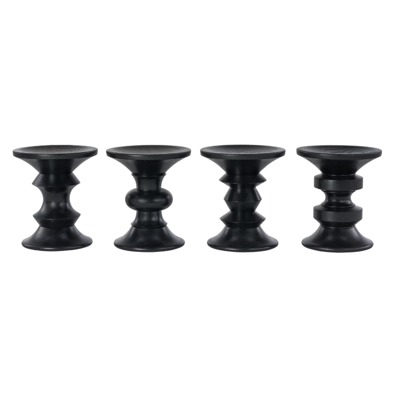 The Eames Turned Stool from Herman Miller in ebony in all the shape options.