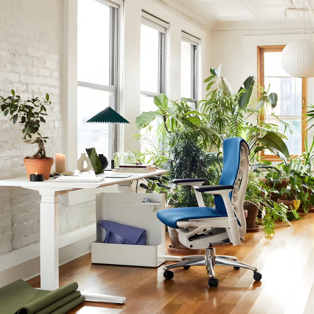 The Embody Chair from Herman Miller with blue grotto medley fabric in a living room. all-groups