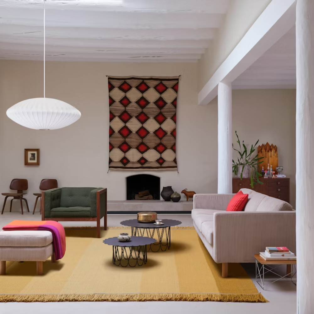 The anthracite Girard Flower Table from Herman Miller in a living space. all-groups