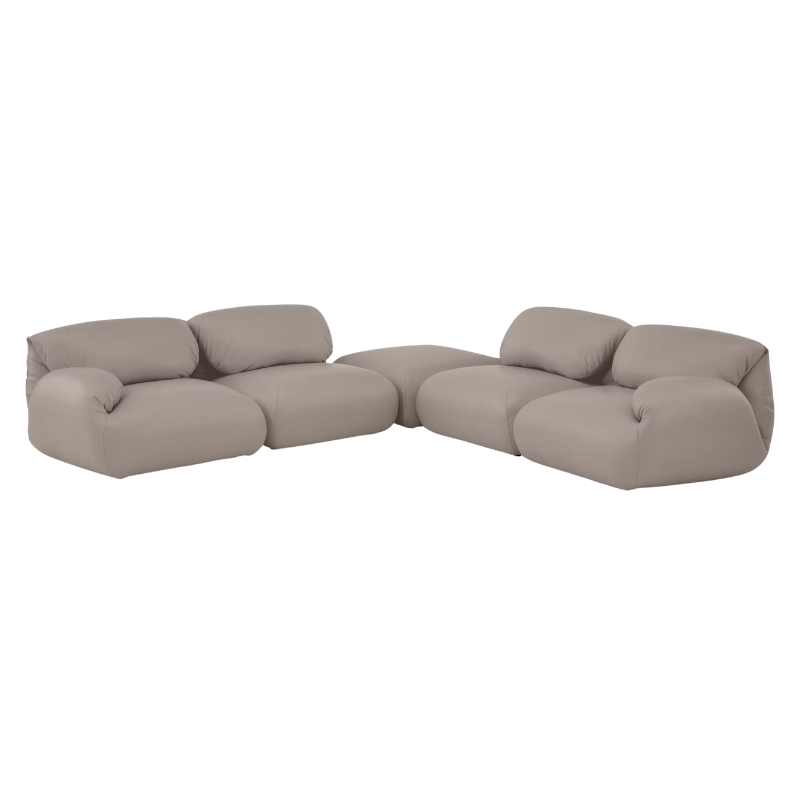 Fold up, down, or reconfigure as you please. The Luva Modular Sectional presents timeless beauty in an inventive form. Created by designer Gabriel Tan, Luva is a case study for probing at the intersections of art, design, and culture. The sectional's elemental form is inspired by the soft-rolled tops of Japanese futons and the padded tactility of a boxing glove.