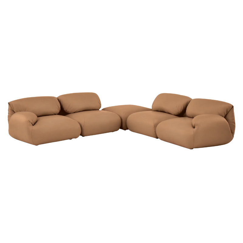 Fold up, down, or reconfigure as you please. The Luva Modular Sectional presents timeless beauty in an inventive form. Created by designer Gabriel Tan, Luva is a case study for probing at the intersections of art, design, and culture. The sectional's elemental form is inspired by the soft-rolled tops of Japanese futons and the padded tactility of a boxing glove.