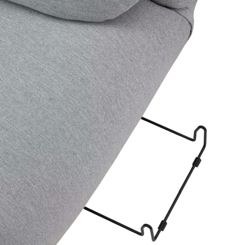 The Luva Modular Ganging Bracket from Herman Miller is used under a sectional sofa seat.