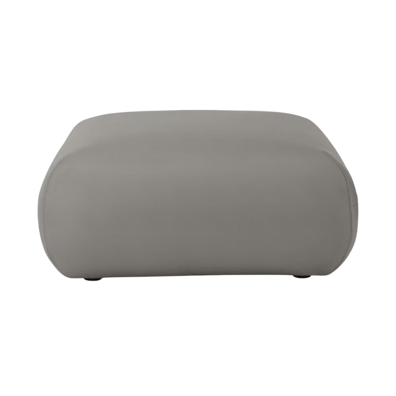 The Luva Modular Ottoman with script prone leather upholstery from Herman Miller.