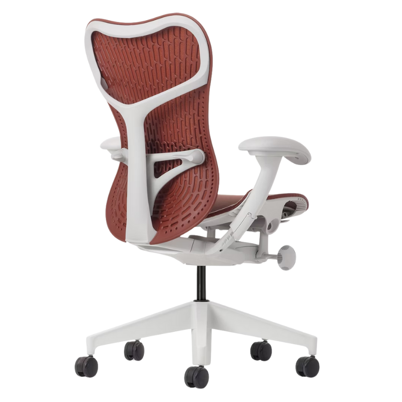 The Mirra 2 Chair from Herman Miller with the butterfly suspension back and alpine frame in cordovan color from the back at an angle.