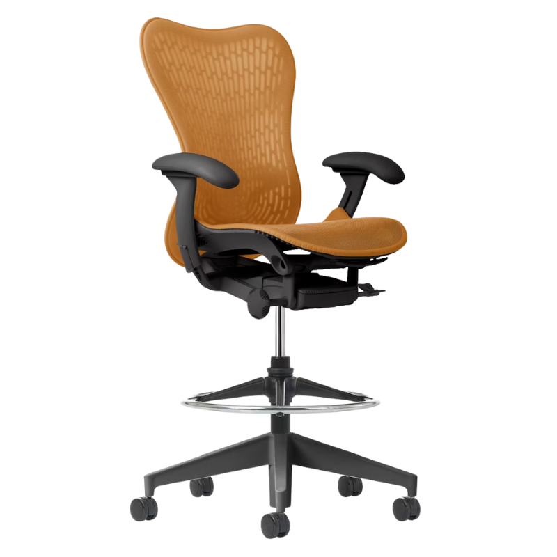 The Mirra 2 Stool from Herman Miller with the Butterfly Suspension Back, graphite frame and ochre color.