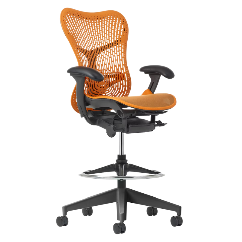 The Mirra 2 Stool from Herman Miller with the Triflex Polymer Back, graphite frame and ochre color.