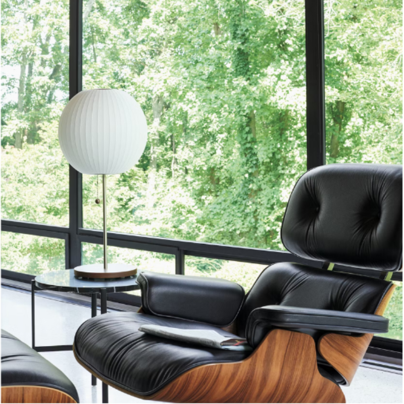 The Nelson Ball Lotus Table Lamp from Herman Miller in a living room. all-groups