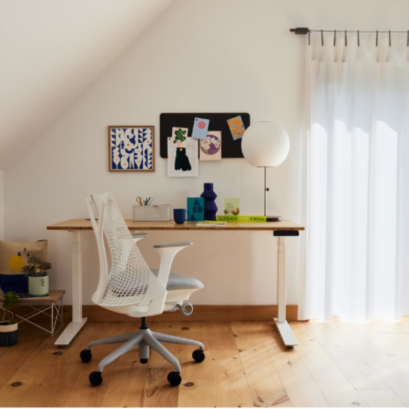 The Nelson Ball Lotus Table Lamp from Herman Miller in an office.