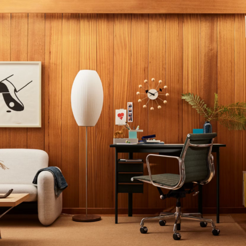 The walnut medium Nelson Cigar Lotus Floor Light from Herman Miller in a home office.