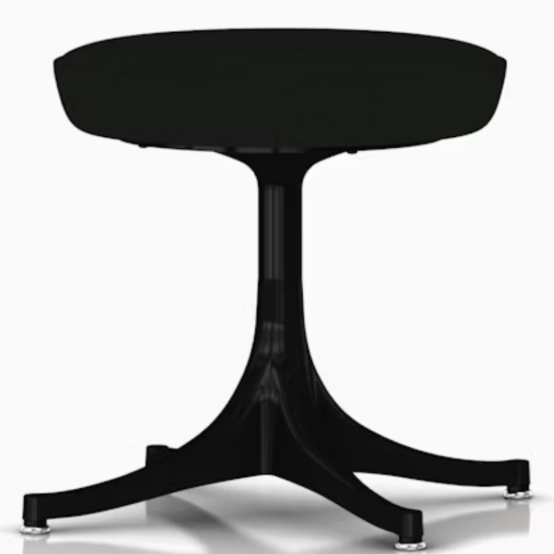 The Nelson Pedestal Stool from Herman Miller with black hopsak upholstery and a black base.