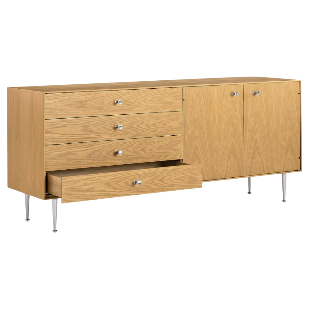 The Nelson Thin Edge Buffet from Herman Miller in white oak with a drawer open.