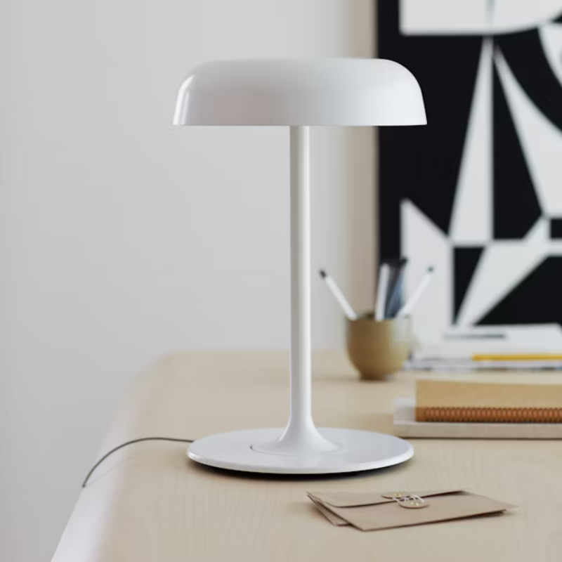 The Ode Desk Lamp from Herman Miller in a lounge.